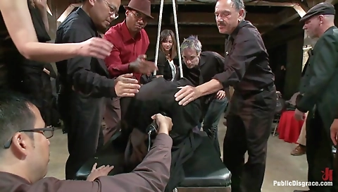 Horny bitch gets double penetration in her locked up pussy